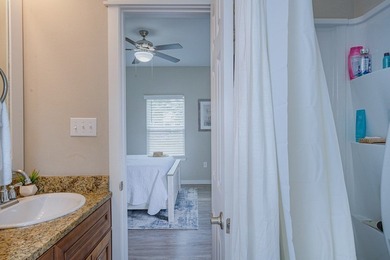 Nestled in the waterfront community of Holiday Beach, this - photo 29