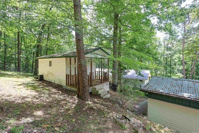 Enjoy seasonal views of Lake Greeson from this 3-bedroom, 2-bath - photo 30