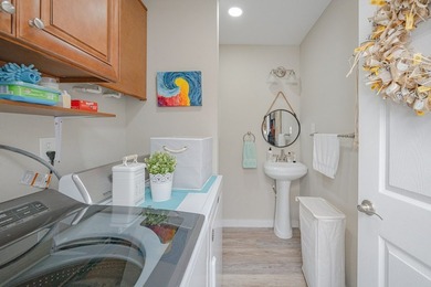 Nestled in the waterfront community of Holiday Beach, this - photo 31