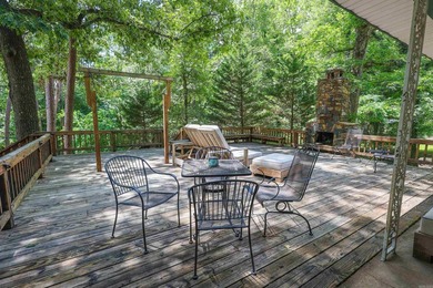 Enjoy seasonal views of Lake Greeson from this 3-bedroom, 2-bath - photo 34