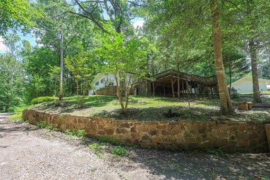 Enjoy seasonal views of Lake Greeson from this 3-bedroom, 2-bath - photo 36