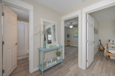 Nestled in the waterfront community of Holiday Beach, this - photo 36