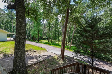 Enjoy seasonal views of Lake Greeson from this 3-bedroom, 2-bath - photo 37