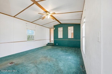 INVESTOR OPPORTUNITY!! Single wide manufactured home situated on