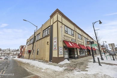 This classic 1920's masonry commercial building was the original