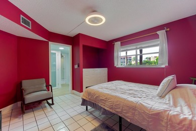 Welcome to this spacious 2-bedroom, 2-bath condominium located - photo 5