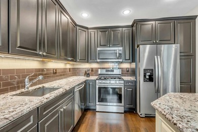 Welcome to Riverwalk - a highly desirable condominium community - photo 17