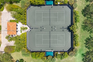 Nestled within the ultra-exclusive, guard-gated community of - photo 11