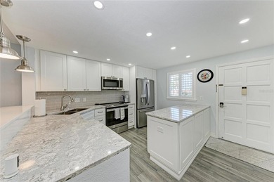 Exceptional location with fabulous water views! Situated on the - photo 12