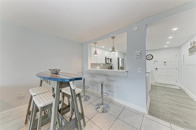 Exceptional location with fabulous water views! Situated on the - photo 14