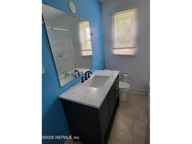 Very solid block home. This property would make a great first - photo 8