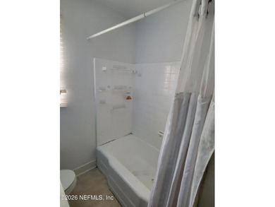 Very solid block home. This property would make a great first - photo 9