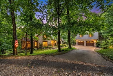 Nestled in the peaceful forest of Eureka Springs, this - photo 2