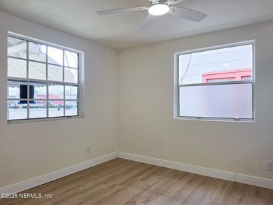 Completely renovated and move-in ready! This charming concrete - photo 3
