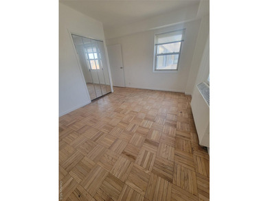 THIS UNIT HAS A SPECTACULAR VIEW OF THE CITY SKYLINE, LOCATED IN - photo 11