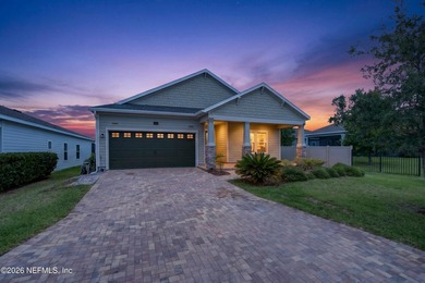 Welcome to this beautiful newer construction home in the highly - photo 1