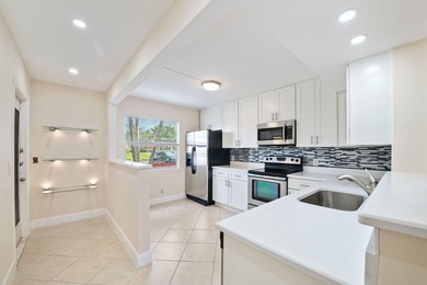 Rarely available first-floor corner unit in the highly - photo 1