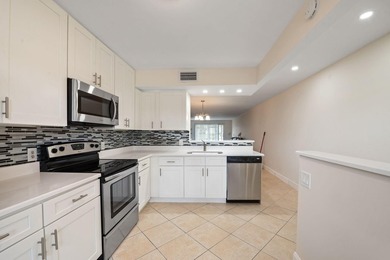 Rarely available first-floor corner unit in the highly - photo 2