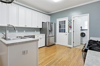 Fantastic Opportunity! This ranch home sits on just under half