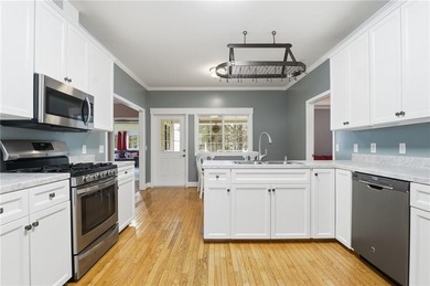 Fantastic Opportunity! This ranch home sits on just under half