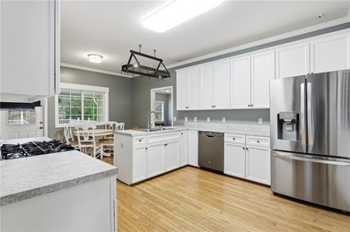 Fantastic Opportunity! This ranch home sits on just under half