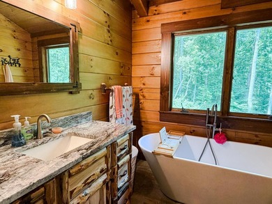Captivating & decidedly unique log property, set amidst the - photo 33