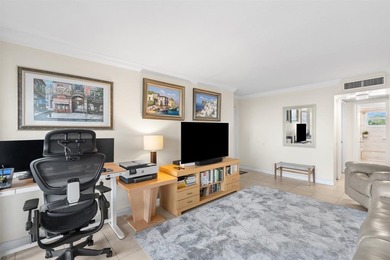 Located in the desirable Pine Island Ridge / Live Oak community