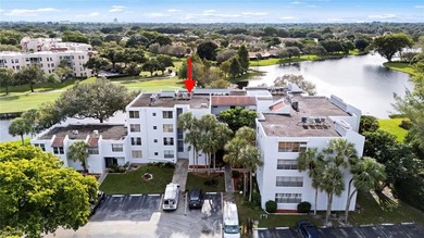 Located in the desirable Pine Island Ridge / Live Oak community