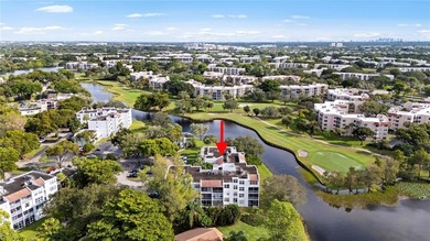 Located in the desirable Pine Island Ridge / Live Oak community