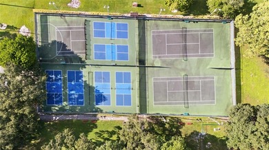 Located in the desirable Pine Island Ridge / Live Oak community