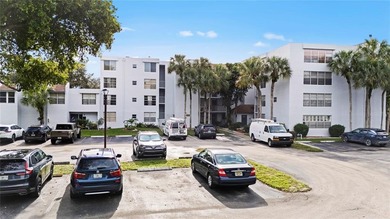 Located in the desirable Pine Island Ridge / Live Oak community