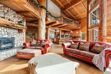 This spectacular Lodge-style home is truly unparalleled on the - photo 3