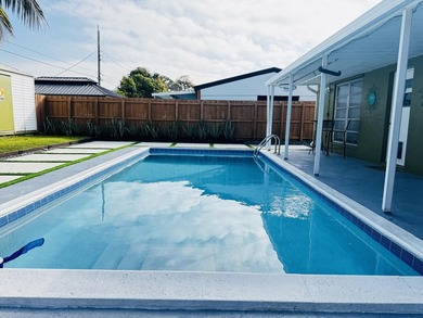 Create lasting family memories in this 3/2 pool Home in - photo 2