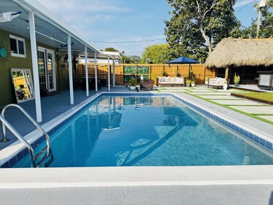 Create lasting family memories in this 3/2 pool Home in - photo 3