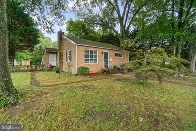 Step into a surprisingly spacious 3BR, 1.5BA rancher that - photo 3