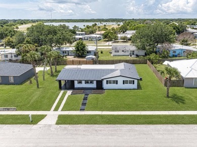 Better than new construction! Massive 1,900+ sq ft 3BD/2BA block - photo 1