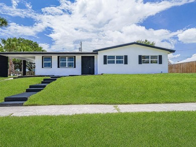 Better than new construction! Massive 1,900+ sq ft 3BD/2BA block - photo 2