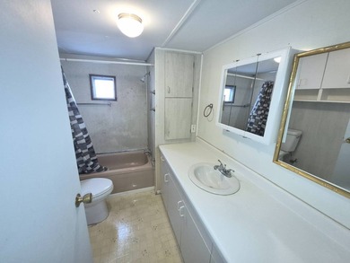 PRICED TO SELL FAST - SPACIOUS 1970 MOBILE HOME WITH FLORIDA - photo 11