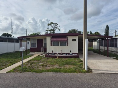 PRICED TO SELL FAST - SPACIOUS 1970 MOBILE HOME WITH FLORIDA - photo 17