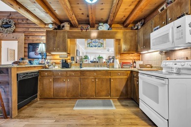 Situated beneath towering oak trees on a secluded one-acre - photo 19