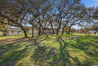 564' of Lake Buchanan shoreline. 6.3 acres. Eleven cabins. This - photo 9