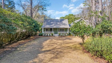 Situated beneath towering oak trees on a secluded one-acre - photo 36