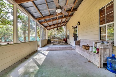 Situated beneath towering oak trees on a secluded one-acre - photo 38