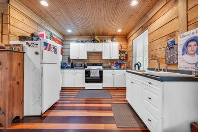 Situated beneath towering oak trees on a secluded one-acre - photo 41