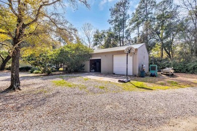 Situated beneath towering oak trees on a secluded one-acre - photo 44
