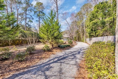 Situated beneath towering oak trees on a secluded one-acre - photo 47