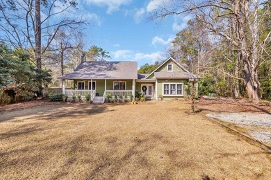 Situated beneath towering oak trees on a secluded one-acre - photo 49