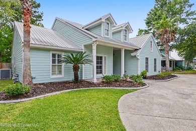 Experience coastal living at its finest in this beautifully - photo 1