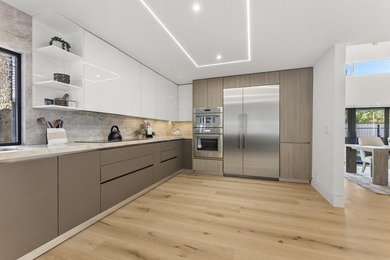 Coastal luxury meets modern perfection in these stunning - photo 12