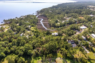 Build your ideal coastal retreat on this oversized 0.78-acre - photo 13